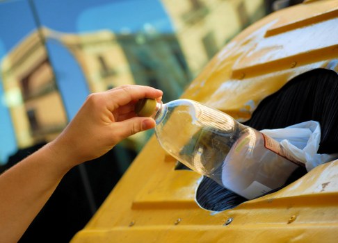 Clean streets in North West London with rubbish collection trucks